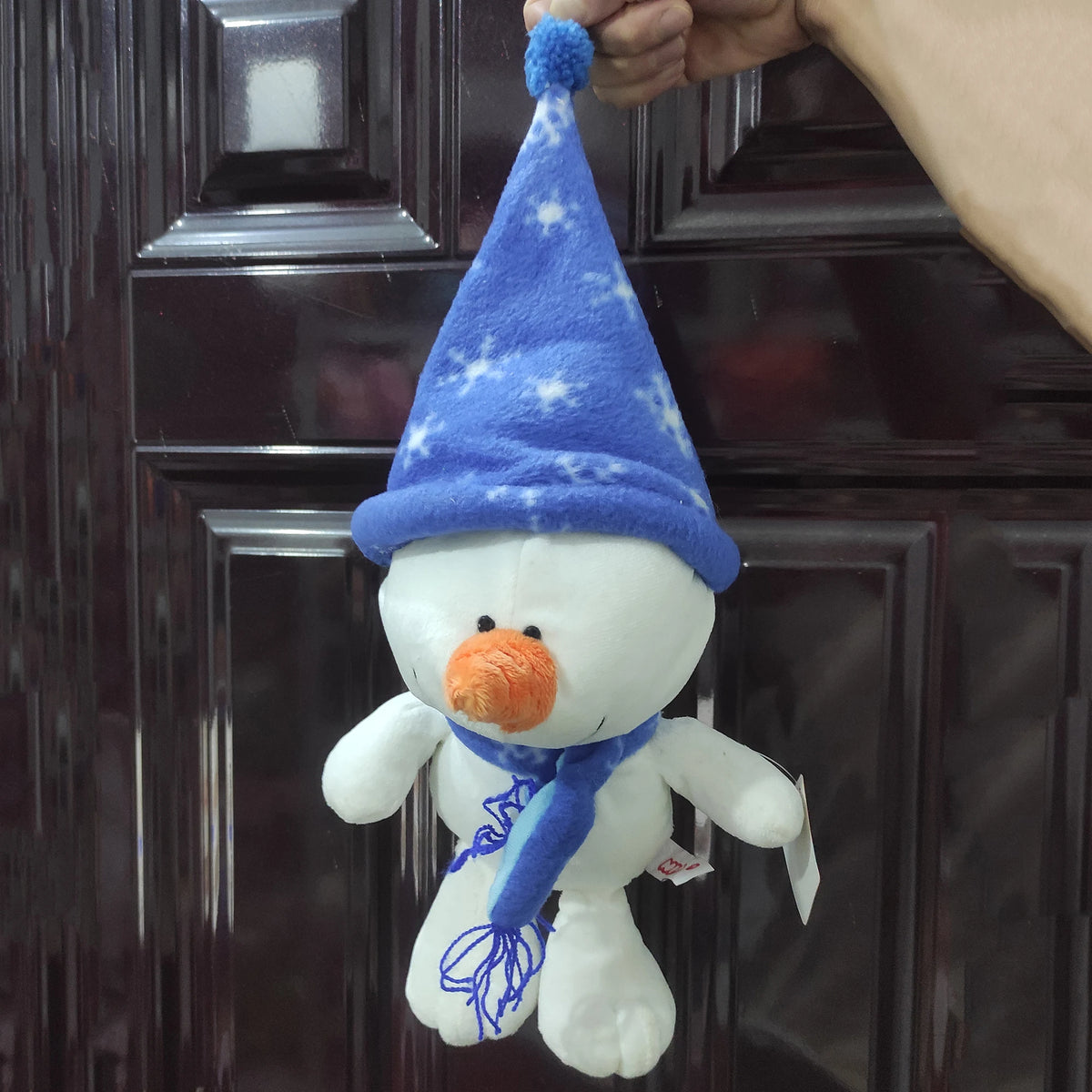 Embrace Winter Magic with the Snowman Plush Doll