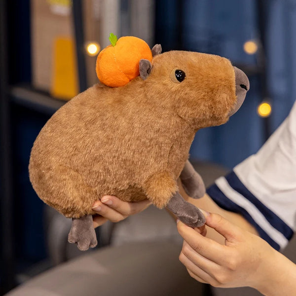 Capybara Plush Doll – A Cozy Companion with Pumpkin Charm