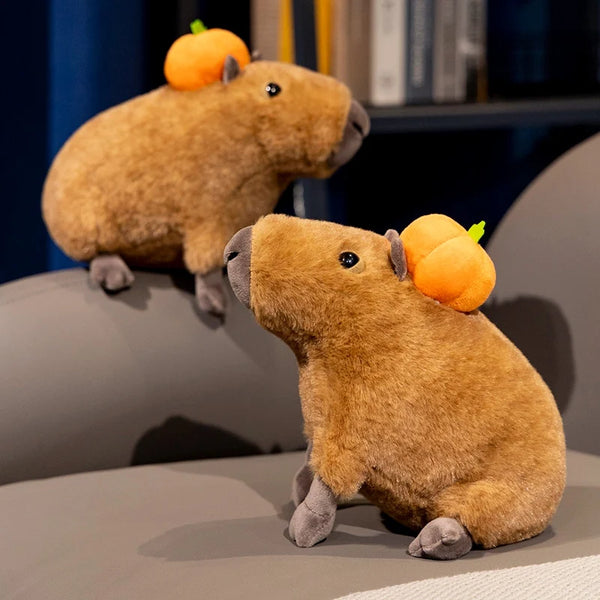 Capybara Plush Doll – A Cozy Companion with Pumpkin Charm