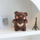  dark brown bear